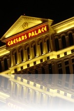 Caesars Palace nighttime over Lake Bellagio